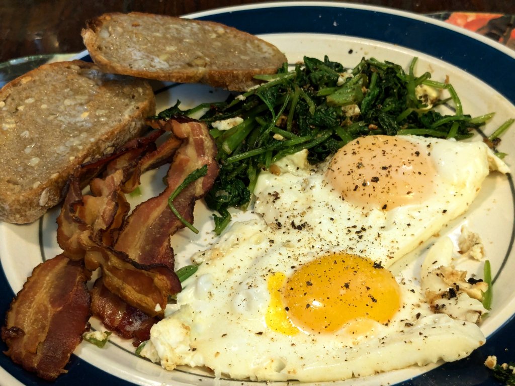 2024-09-14 eggs, bacon, radish greens, and whole meal and sunflower seed toast1.jpg