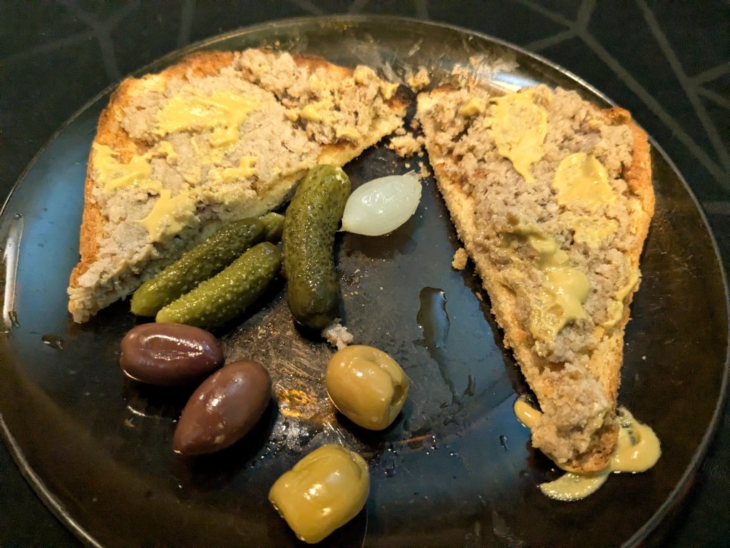 2024-10-11 Snack of homemade créton on khorasan wheat bread with Dijon mustard, olives, and gh...jpg