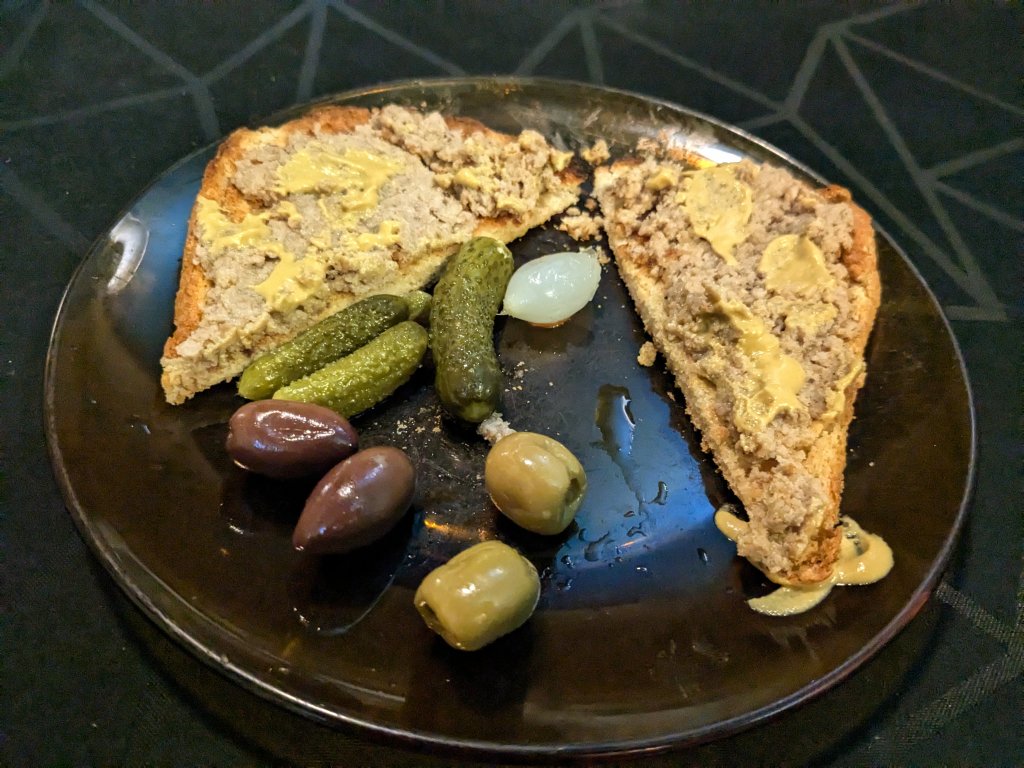 2024-10-11 Snack of homemade créton on khorasan wheat bread with Dijon mustard, olives, and gh...jpg