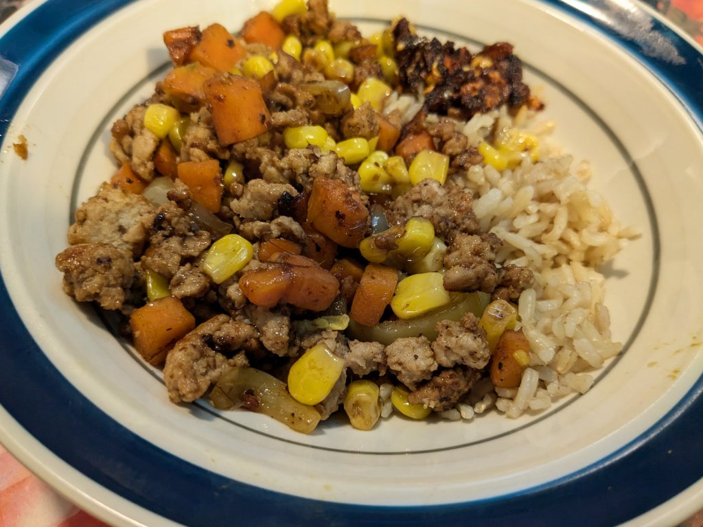 2024-10-17 ground pork stir fry over brown basmati rice with LGM chili crisp.jpg