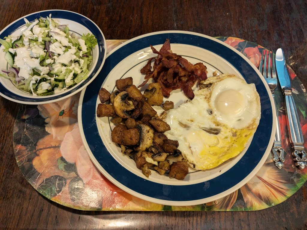 2024-11-10 Breakfast for supper - eggs, bacon, home fries, mushrooms, and a salad with blue ch...jpg