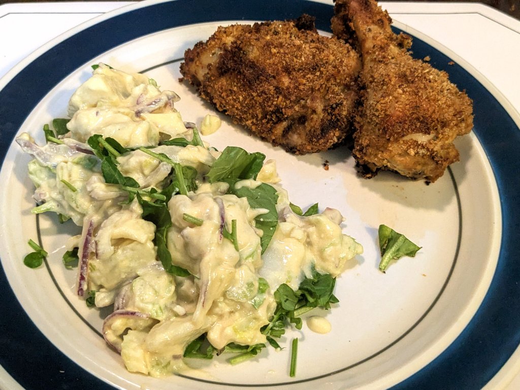 Crispy devilled chicken leg with potato salad and a bit of upland cress.jpg