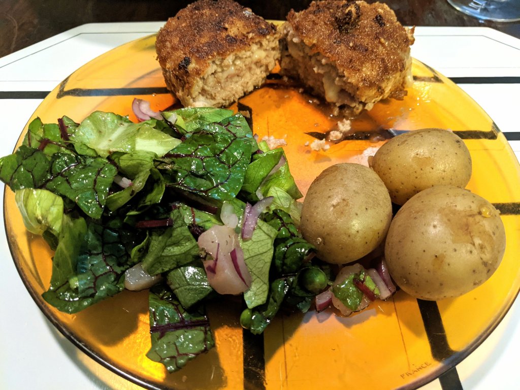 Ground pork cordon bleu (open), small potatoes, and a leafy salad.jpg