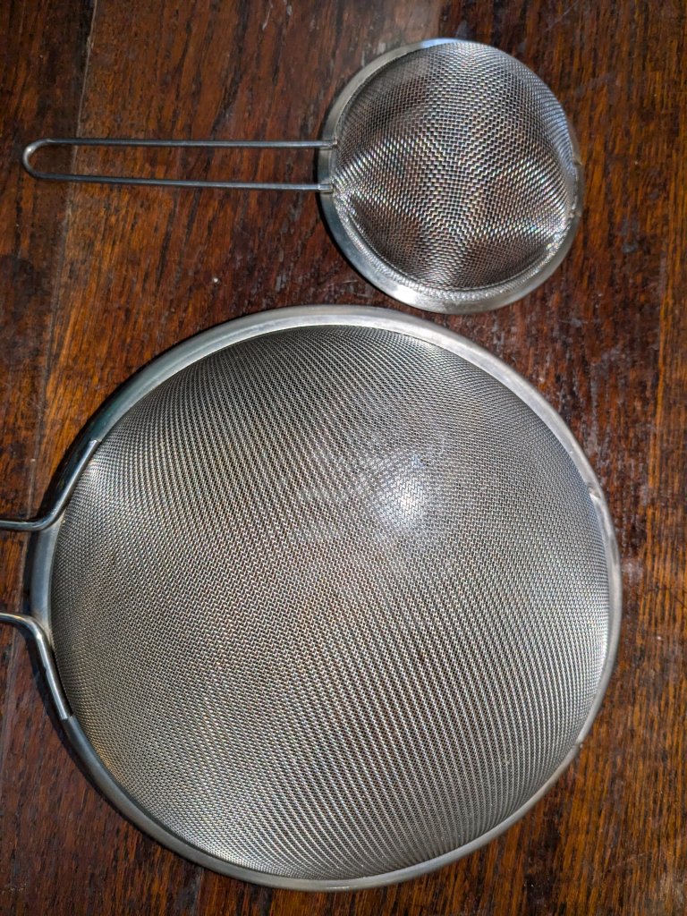 large and small strainers with loops missing.jpg