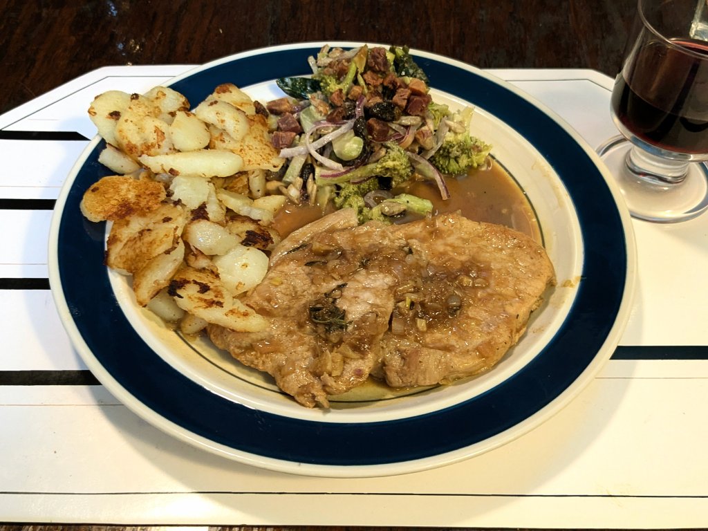 Pork chops Lyonnaise, home fries, and broccoli salad.jpg