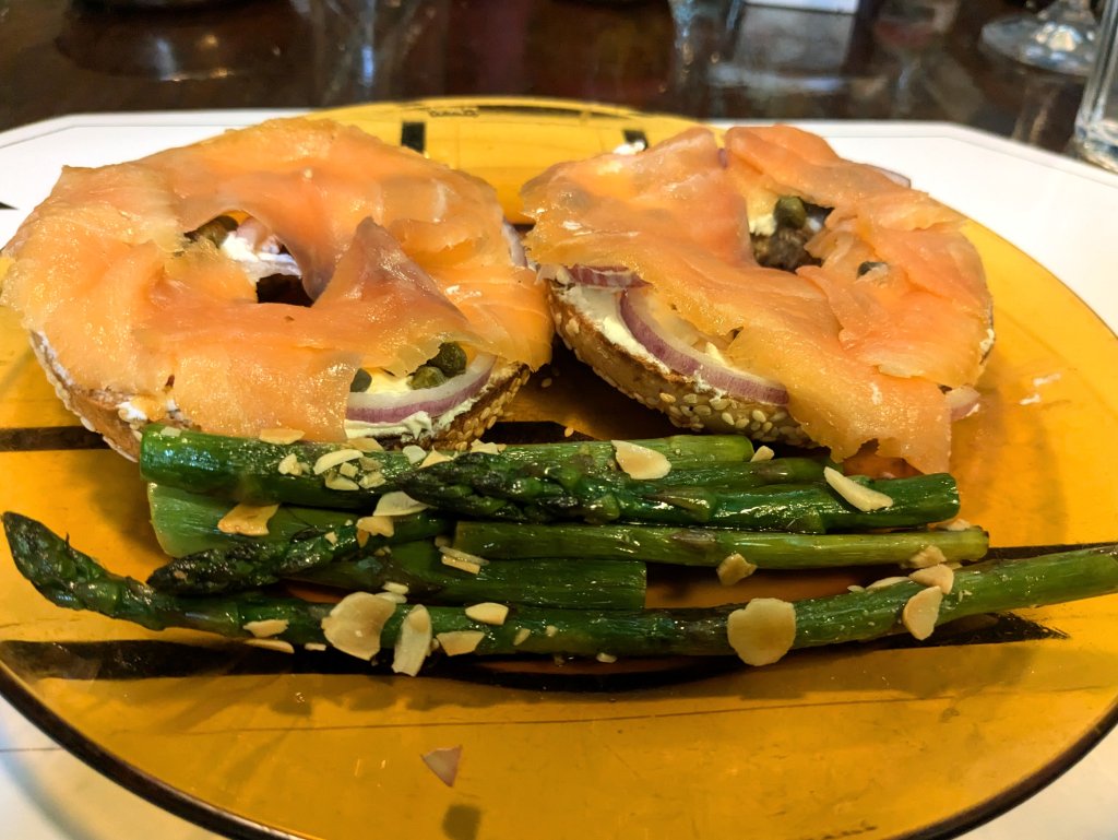 Smoked salmon, bagel, cream cheese, onion, capers, and pan roasted asparagus.jpg