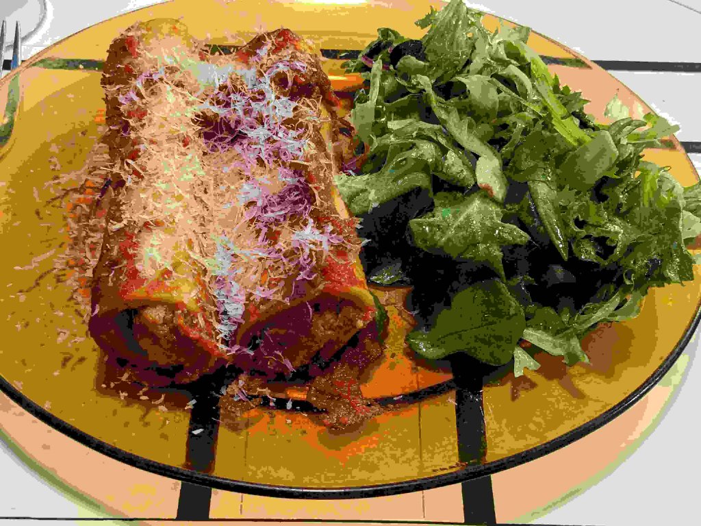 Store bought cannelloni with homemade tomato sauce and a salad.jpg