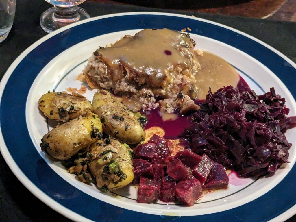 Store bought tourtière with gravy, cumin potatoes, beets, and rødkål.jpg