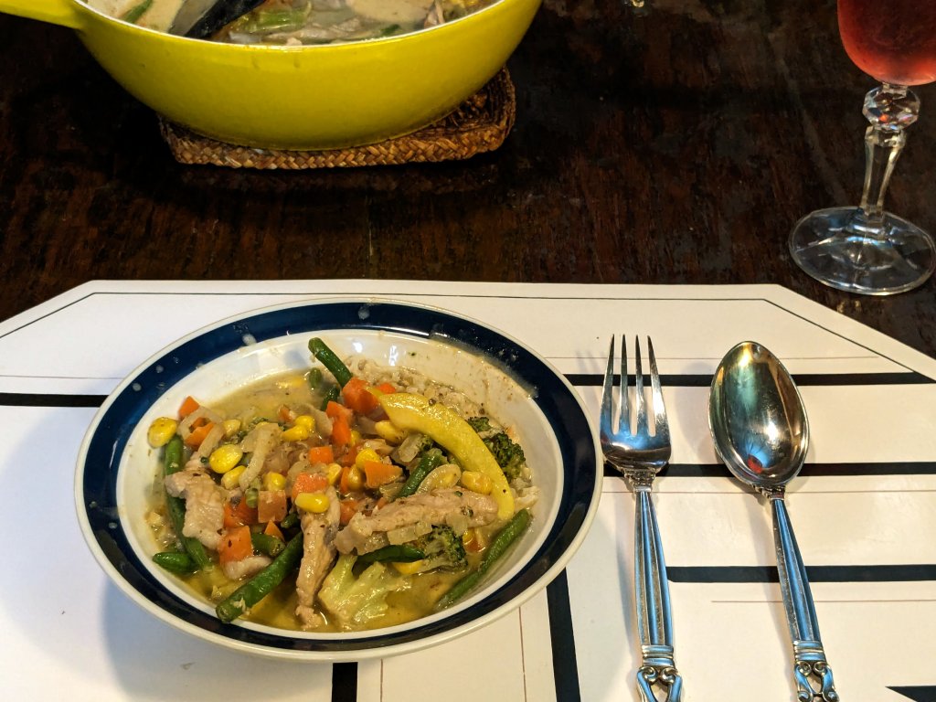 Thai green curry with pork served on brown basmati rice.jpg