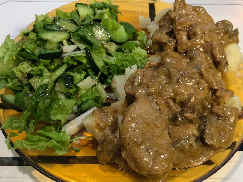 Triple pig in cream leftovers on boiled potatoes, with a leafy salad sm.jpg