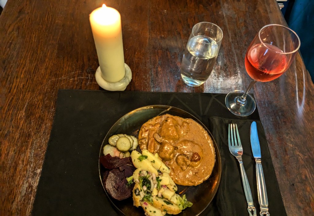 Triple pig with potato salad, cucumber salad, and pickled beets.jpg