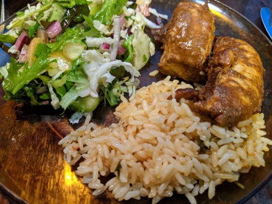 Chicken breast in red shish taouk marinade, leftover rice pilaf, and a salad.jpg