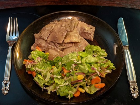 Ravioli from frozen with a garlic-anchovy-cream & pesto sauce and a salad.jpg