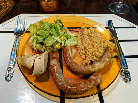 Roast chicken and merguez sausages, whole wheat couscous, and a salad.jpg