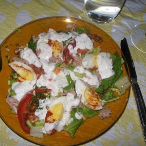 Assembled salad with tuna, eggs, and homemade ranch dressing