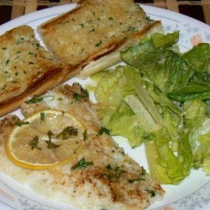 Baked cod, caeser salad and garlic bread