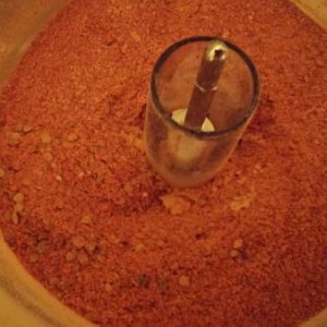 The dried seeds, skin, and pulp of tomatoes made into tomato powder!  The tomato flavor is very intense!