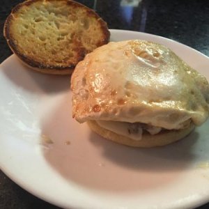 Homemade English muffin with sausage, Jack cheese and egg.