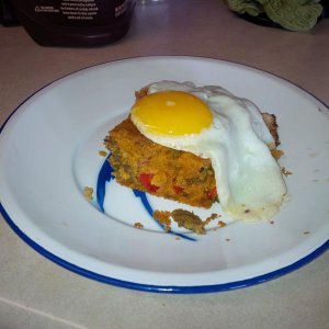 spicy, loaded cornbread with fried egg on top