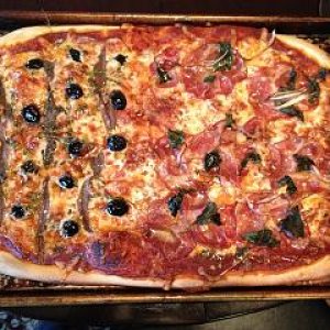 Pizza with Anchovies and Black Olives