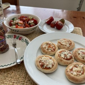 Trader Joe's Mini Pizzas with a Chopped Salad, Anchovies on the side and Stuffed Hot Cherry Peppers, my husband was in heaven!