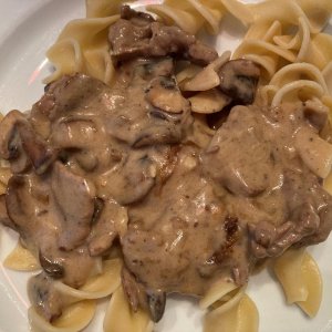 Beef Stroganoff made with NY Strip Steak (`cuz that's what I had) cut very thinly against the grain and cooked to med-rare, Crimini Mushrooms and Swee