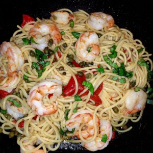 Shrimp, capers, roasted red peppers w/ white truffle extra Virginia olive oil over spaghetti.