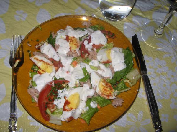 Assembled salad with tuna, eggs, and homemade ranch dressing