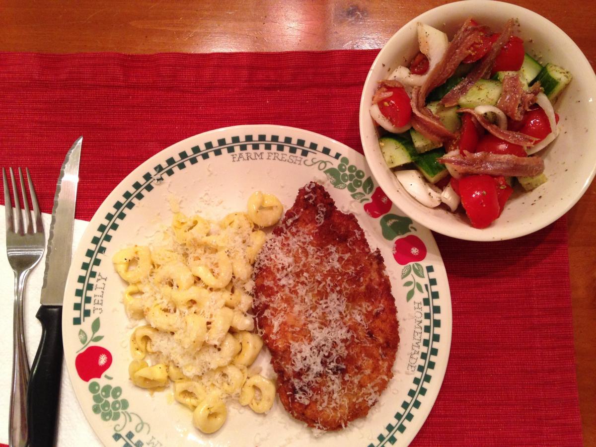 Chicken Milanese with Barilla brand Three Cheese Tortellini and a side chopped Salad, with heard of Anchovies on it for DH, NOT moi!