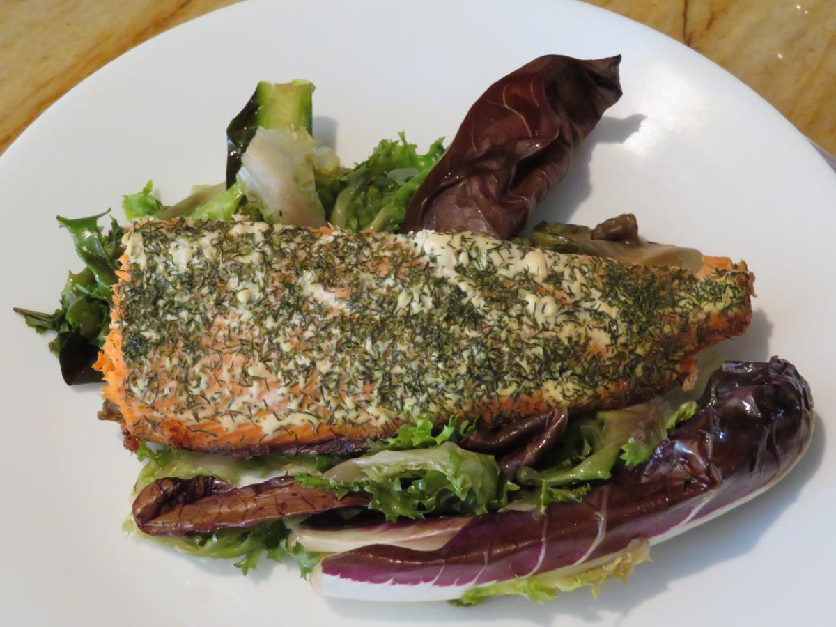 dill salmon on mixed greens