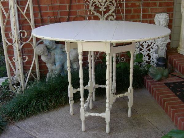 GRANDMA'S GATELEG TABLE USED WITH A RECTANGULAR MARBLE TOP