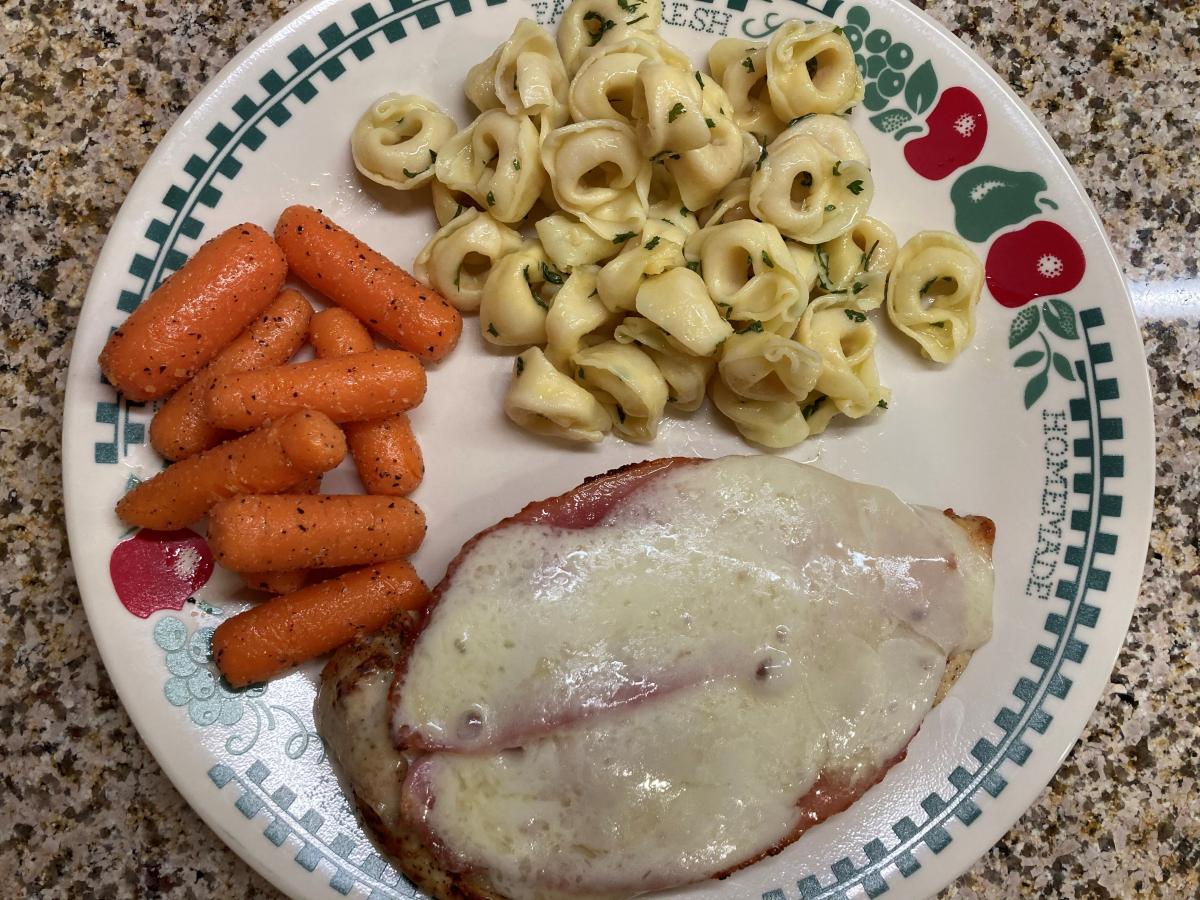 My take on Sizzler's Malibu Chicken, served with Barilla brand Three Cheese Tortellini and glazed Carrots.