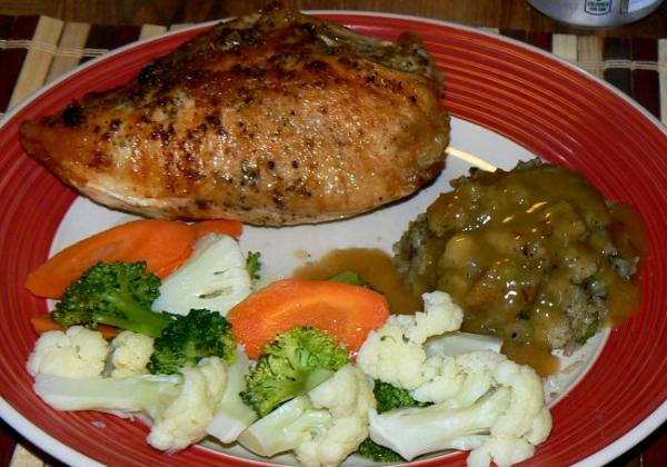 Roast chicken breast, gravy, stuffing and steamed fresh veggies.