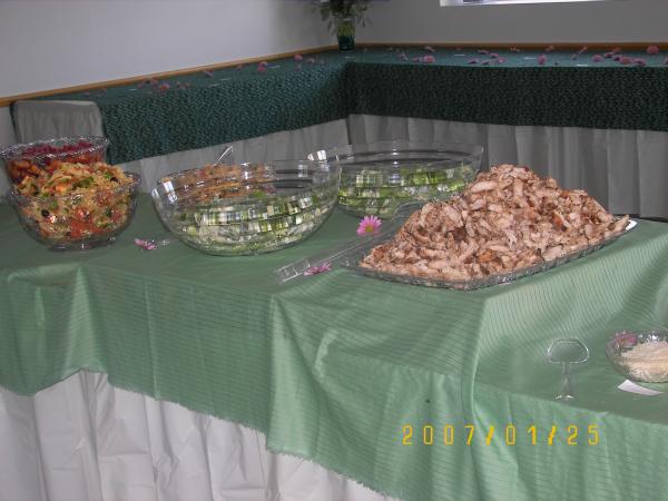 The food.. We had an outdoor wedding, the food was indoors. 
We put all the food together. The main part was grilled chicken cesar salad. We had a nic