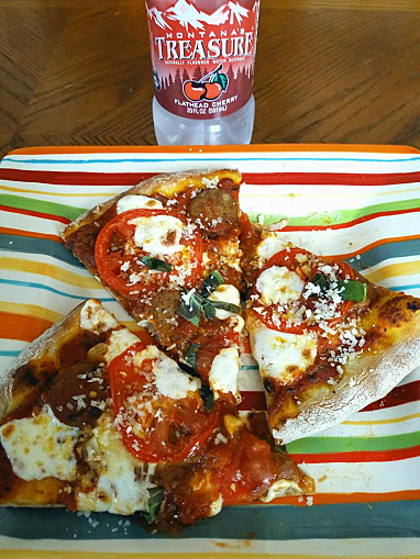 Tomato,basil, sausage pizza...