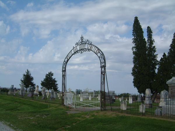 White Oak cemetery entrance in rural Mahaska County Iowa. One set of my great great grandparents live here.